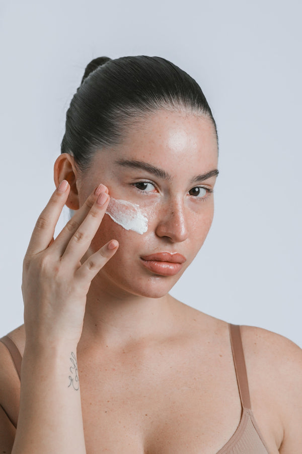A swipe of cream applied to the cheek