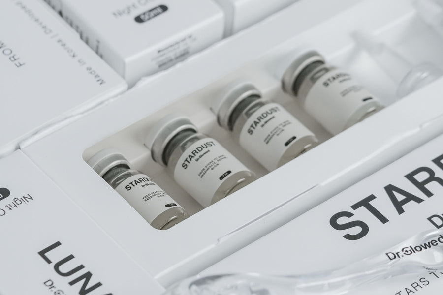 The STARDUST box open, ampoule label visible